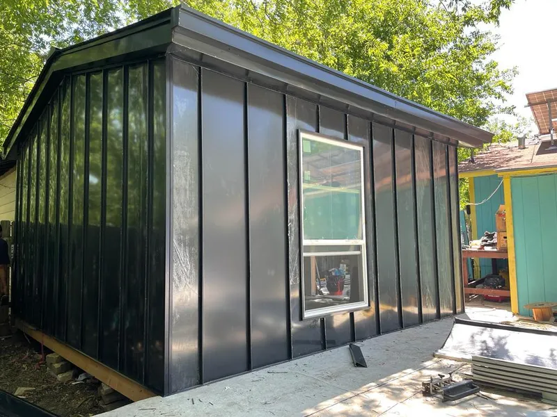 Black standing seam metal wall panels for Metal Roof Installation in Manitowoc