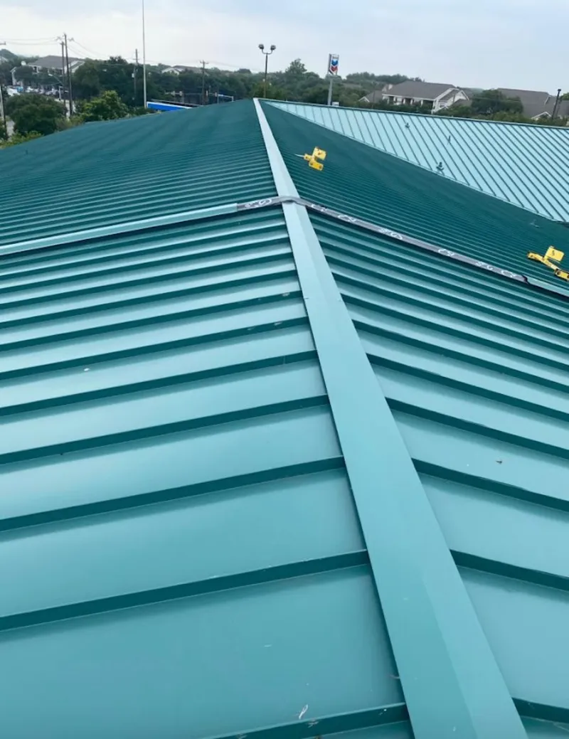 Green commercial metal roof ridge and valley for Metal Roof Repair in Manitowoc