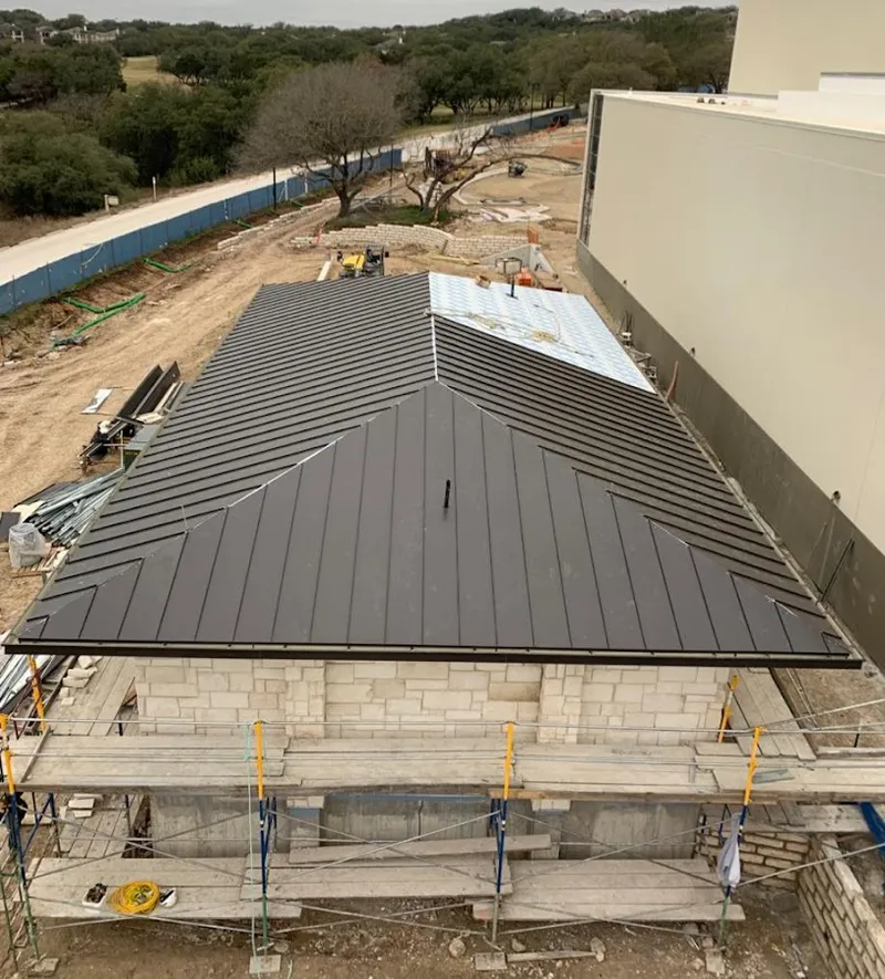 Metal roof new construction with scaffolding in Manitowoc